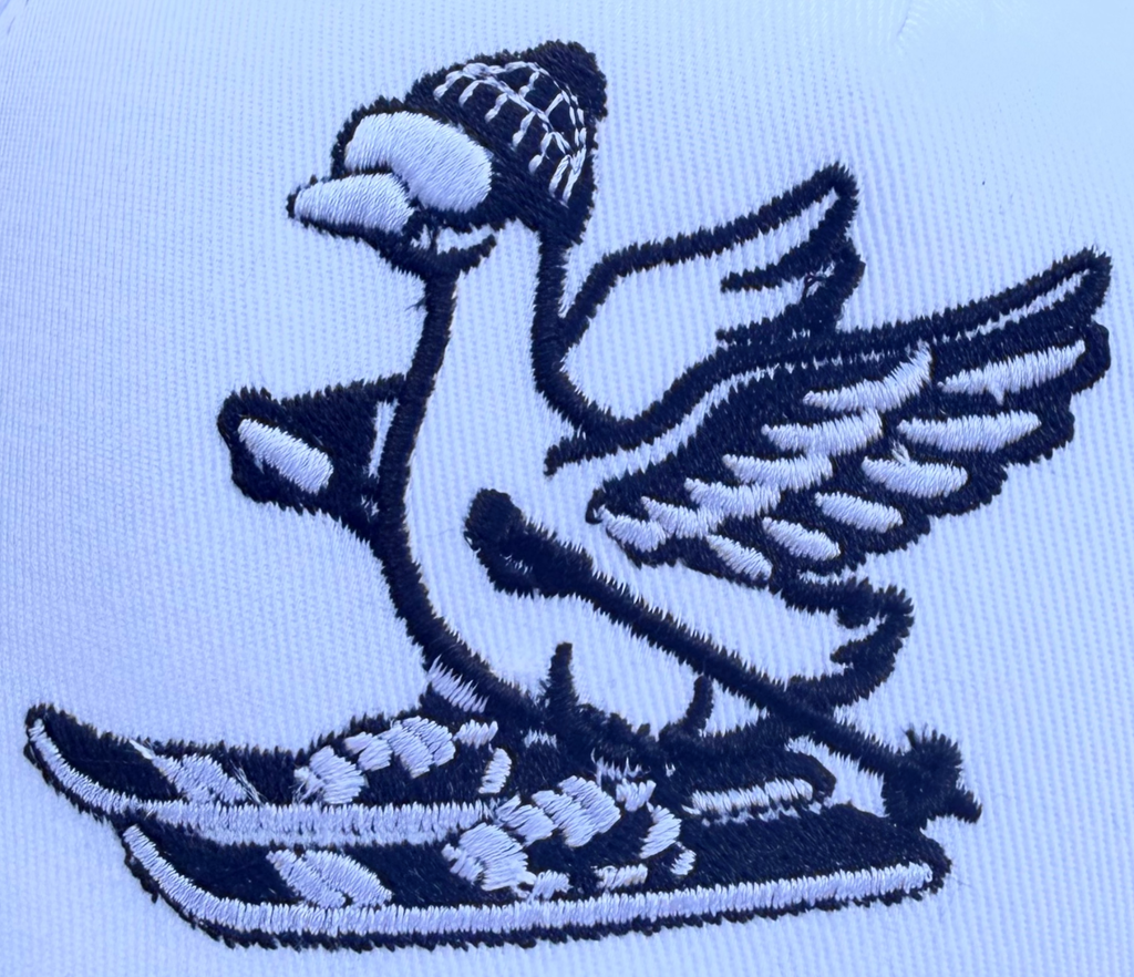 Skiing Goose Baseball Cap